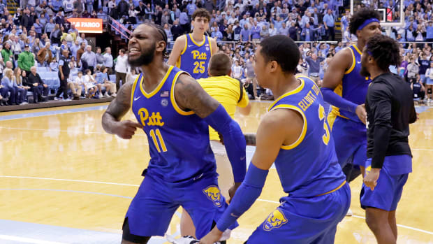 Pittsburgh’s Jamarius Burton celebrates after beating UNC